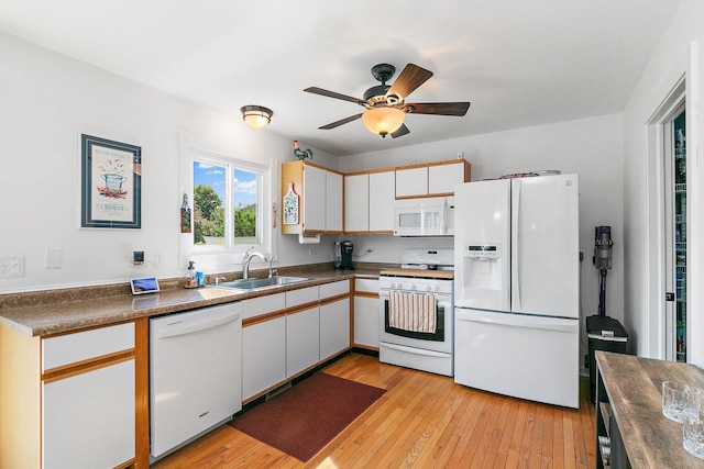1239 Angeline Dr, South Elgin, IL 60177 - kitchen featuring white appliances, dark countertops, a ceiling fan, and light wood-type flooring