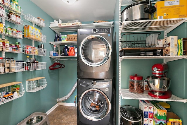 1239 Angeline Dr, South Elgin, IL 60177 - washroom with stacked washing machine and dryer and baseboards