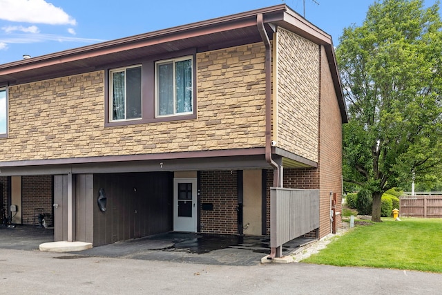 7 Cour Versaille, Palos Hills, IL 60465 - townhome / multi-family property with brick siding and a front yard