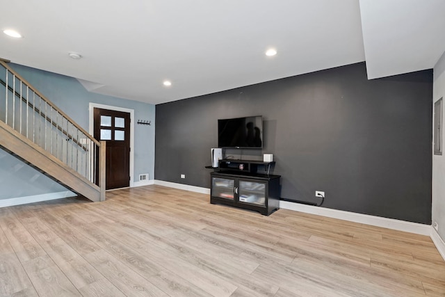 7 Cour Versaille, Palos Hills, IL 60465 - unfurnished living room with stairs, wood finished floors, and recessed lighting