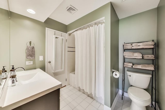 920 N Lakeside Dr Unit 1D, Vernon Hills, IL 60061 - bathroom with vanity, tile patterned floors, and shower / tub combo with curtain