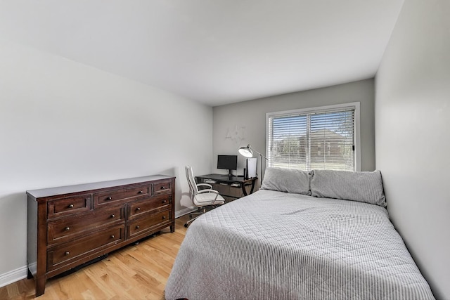920 N Lakeside Dr Unit 1D, Vernon Hills, IL 60061 - bedroom with light wood-type flooring and baseboards