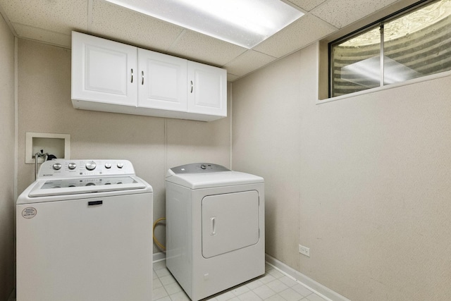45W984 Mcdonald Rd, Hampshire, IL 60140 - laundry area with cabinet space, washer and dryer, and light tile patterned flooring
