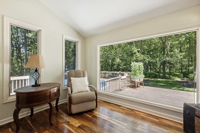 45W984 Mcdonald Rd, Hampshire, IL 60140 - sitting room with lofted ceiling, healthy amount of natural light, and wood finished floors