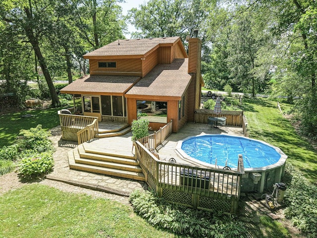 45W984 Mcdonald Rd, Hampshire, IL 60140 - swimming pool featuring a wooden deck and a lawn