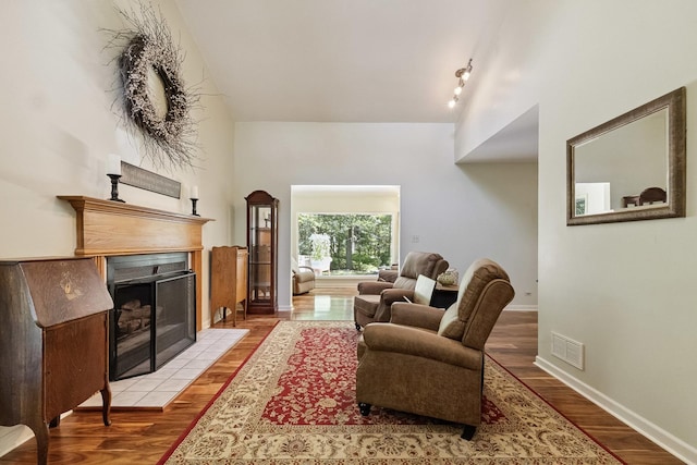 45W984 Mcdonald Rd, Hampshire, IL 60140 - living room with a tile fireplace, light wood finished floors, and track lighting