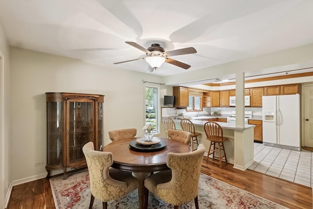 45W984 Mcdonald Rd, Hampshire, IL 60140 - dining room featuring ceiling fan and light wood-style flooring
