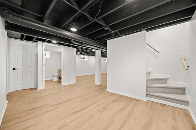 5632 S Natoma Ave, Chicago, IL 60638 - below grade area featuring stairway and wood finished floors