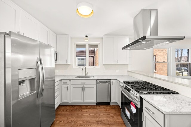 5632 S Natoma Ave, Chicago, IL 60638 - kitchen featuring stainless steel appliances, exhaust hood, white cabinetry, dark wood-style flooring, and light stone counters