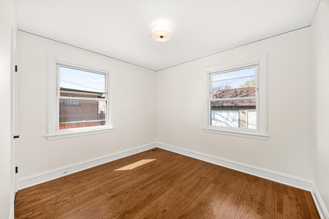5632 S Natoma Ave, Chicago, IL 60638 - unfurnished room featuring wood finished floors and baseboards