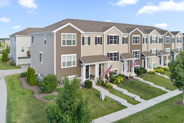 2493 Alison Ave, Pingree Grove, IL 60140 - view of property featuring a front lawn and a shingled roof