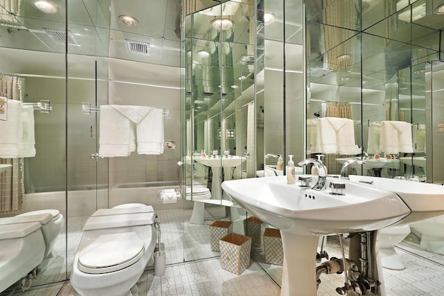 3030 Pheasant Creek Dr Unit 102, Northbrook, IL 60062 - bathroom with a shower stall, tile patterned flooring, a bidet, and tile walls