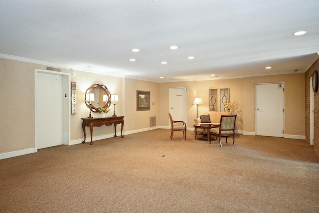 40 S Main St Unit 2D, Glen Ellyn, IL 60137 - sitting room featuring crown molding, recessed lighting, light colored carpet, and elevator