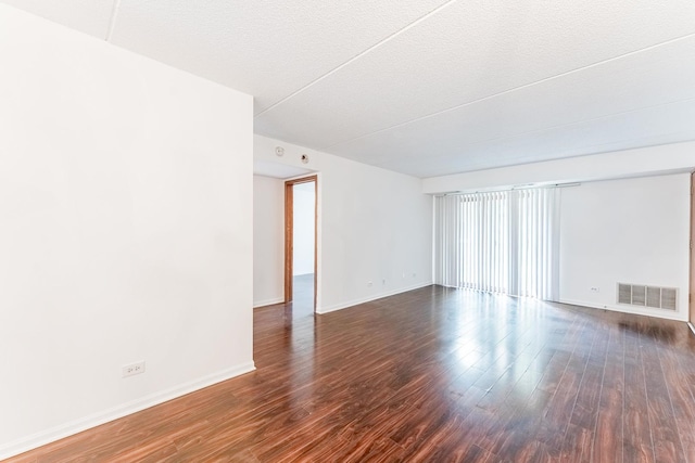 8710 W Evelyn Ln Unit 201, Chicago, IL 60656 - empty room with dark wood-type flooring
