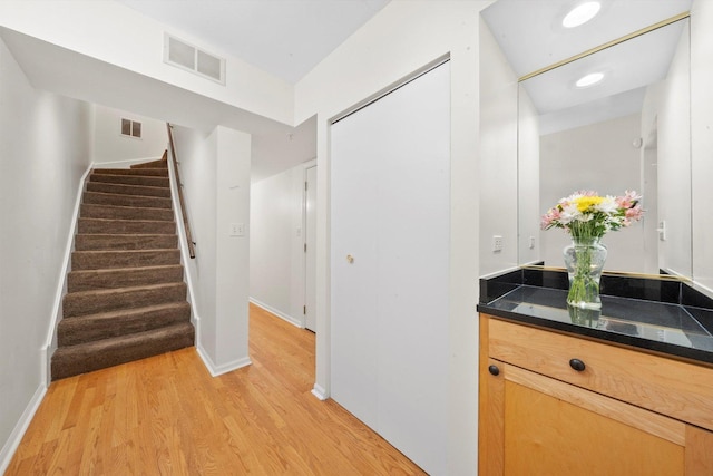 1036 Susan Collins Ln, Oak Park, IL 60302 - bathroom with wood finished floors and vanity