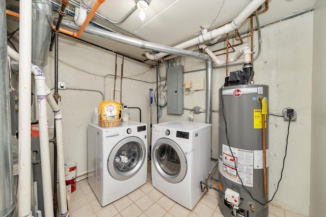 1036 Susan Collins Ln, Oak Park, IL 60302 - washroom featuring water heater, electric panel, separate washer and dryer, and light tile patterned floors