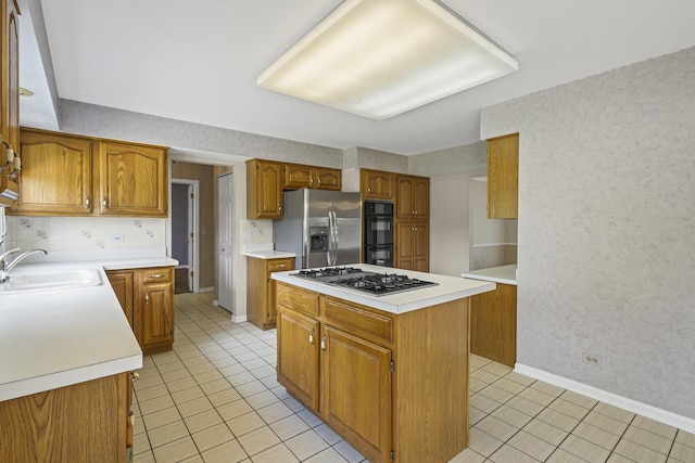 730 Kylemore Dr, Des Plaines, IL 60016 - kitchen with appliances with stainless steel finishes, light tile patterned floors, brown cabinets, a center island, and wallpapered walls