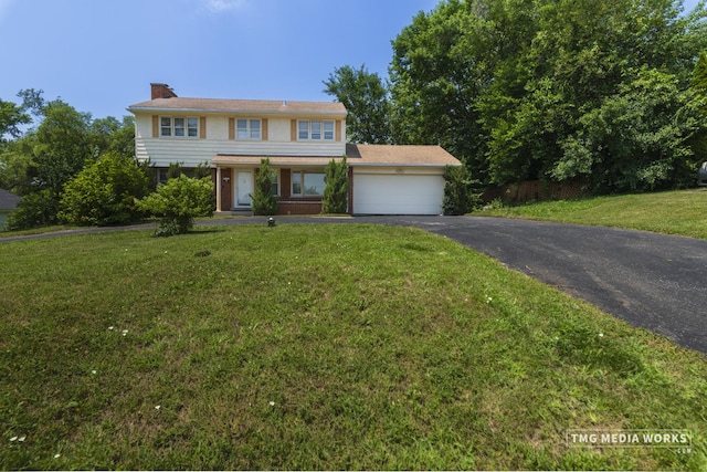 3S138 Park Blvd, Glen Ellyn, IL 60137 - view of front of home with asphalt driveway, an attached garage, a front lawn, and a chimney