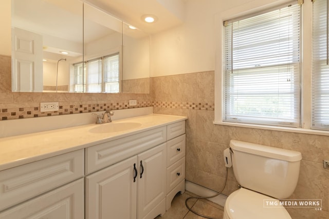 3S138 Park Blvd, Glen Ellyn, IL 60137 - bathroom with tile walls, vanity, and a wainscoted wall