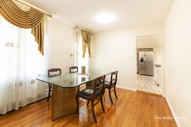3S138 Park Blvd, Glen Ellyn, IL 60137 - dining space featuring wood finished floors and baseboard heating