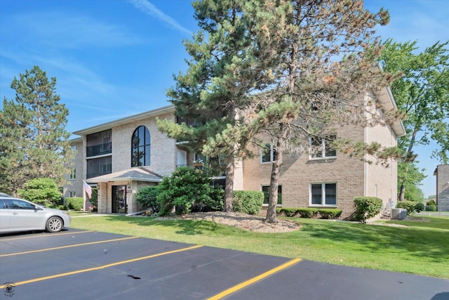 4950 134th Ct Unit 510, Crestwood, IL 60418 - view of building exterior featuring uncovered parking