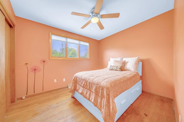 12236 S Hamlin Ave, Alsip, IL 60803 - bedroom with light wood-style floors and ceiling fan