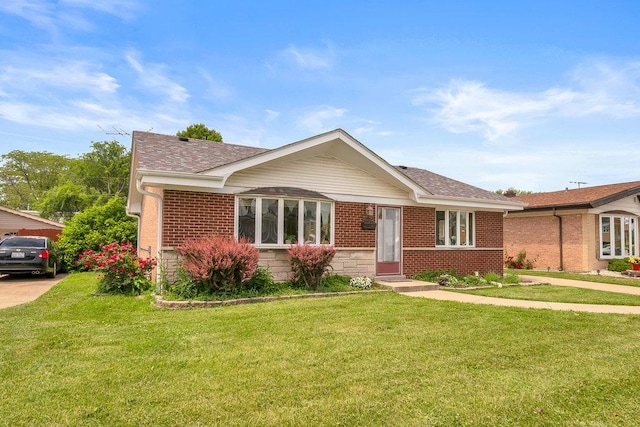 12236 S Hamlin Ave, Alsip, IL 60803 - view of front of home featuring a front lawn, roof with shingles, brick siding, and stone siding