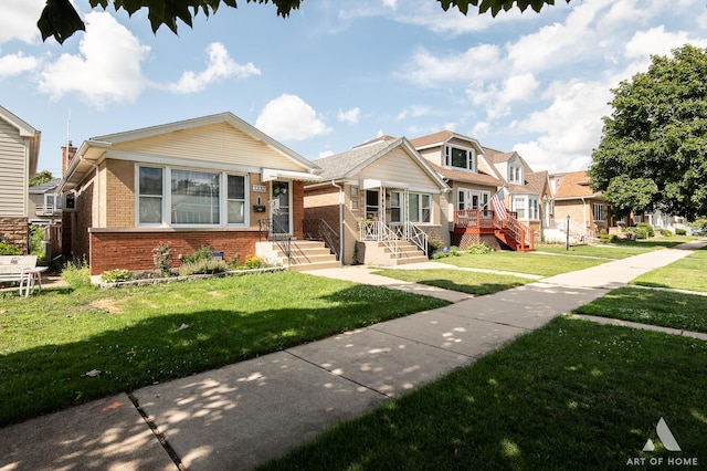 7232 W Everell Ave, Chicago, IL 60631 - view of front of house featuring brick siding, a residential view, and a front yard