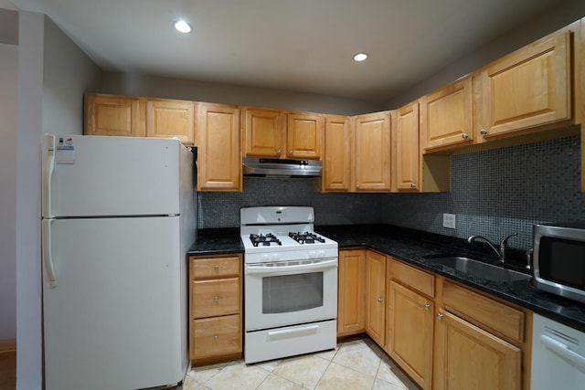 1460 Fairlane Dr Unit 119, Schaumburg, IL 60193 - kitchen featuring white appliances, under cabinet range hood, decorative backsplash, dark stone counters, and light tile patterned floors