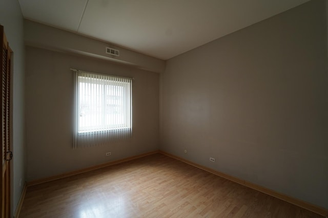 1460 Fairlane Dr Unit 119, Schaumburg, IL 60193 - spare room featuring light wood finished floors