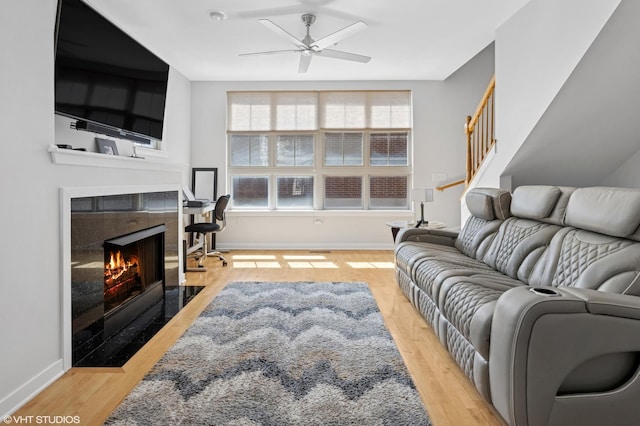 2321 S Wabash Ave Unit 12, Chicago, IL 60616 - living area with a premium fireplace, ceiling fan, wood finished floors, and stairway
