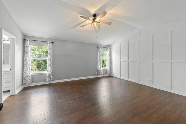 802 Barton Dr, Oswego, IL 60543 - spare room with a ceiling fan, healthy amount of natural light, vaulted ceiling, and dark wood-type flooring