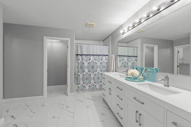 802 Barton Dr, Oswego, IL 60543 - bathroom with double vanity, curtained shower, and marble finish floors