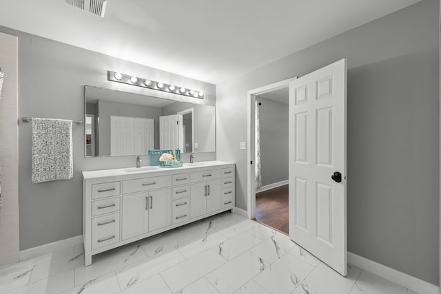 802 Barton Dr, Oswego, IL 60543 - full bath with double vanity and marble finish flooring