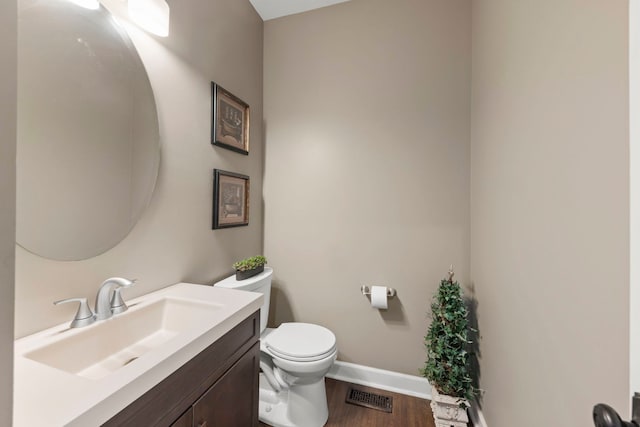 802 Barton Dr, Oswego, IL 60543 - bathroom featuring vanity and wood finished floors