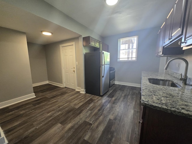 6646 S Wabash Ave, Chicago, IL 60637 - kitchen with stainless steel appliances, dark wood-style flooring, and light stone countertops