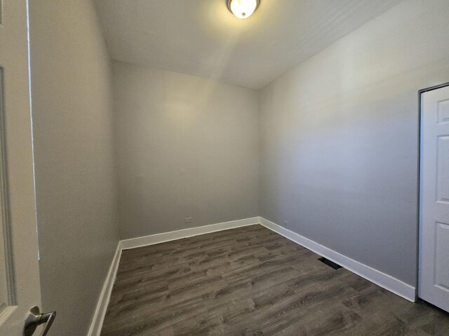 6646 S Wabash Ave, Chicago, IL 60637 - spare room with dark wood-style floors and baseboards