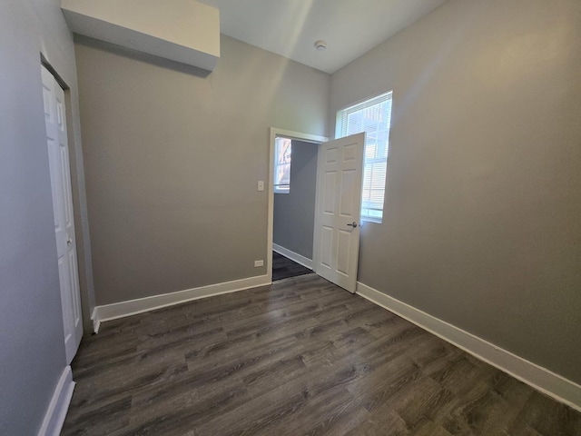 6646 S Wabash Ave, Chicago, IL 60637 - unfurnished bedroom featuring dark wood finished floors and baseboards