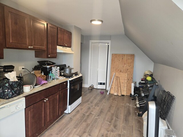 6646 S Wabash Ave, Chicago, IL 60637 - kitchen featuring under cabinet range hood, dishwasher, gas range, light countertops, and wood finished floors