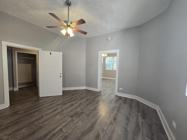 6646 S Wabash Ave, Chicago, IL 60637 - unfurnished bedroom featuring dark wood finished floors, a ceiling fan, a spacious closet, and a closet
