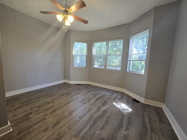 6646 S Wabash Ave, Chicago, IL 60637 - spare room featuring dark wood-style floors and ceiling fan