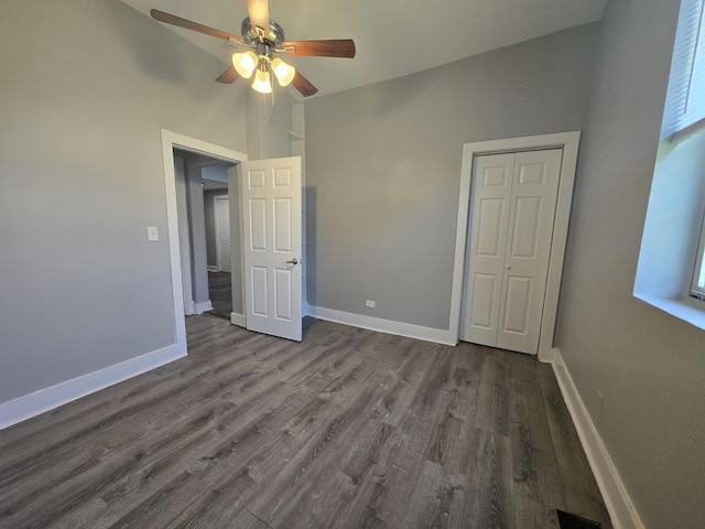 6646 S Wabash Ave, Chicago, IL 60637 - unfurnished bedroom with dark wood-type flooring, lofted ceiling, ceiling fan, and a closet