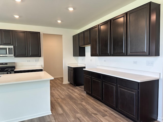 25805 W Springside St, Plainfield, IL 60586 - kitchen with appliances with stainless steel finishes, wood finished floors, light countertops, and recessed lighting