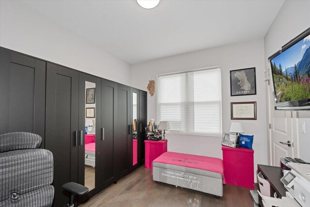 609 E 48th St, Chicago, IL 60615 - bedroom with light wood-type flooring