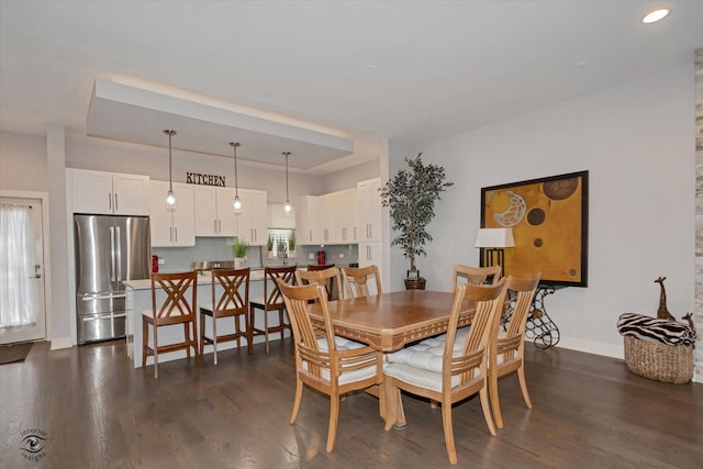 609 E 48th St, Chicago, IL 60615 - dining space featuring dark wood-style flooring and recessed lighting