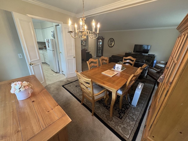 701 Ridge Rd Unit 1D, Wilmette, IL 60091 - dining area featuring a chandelier and crown molding