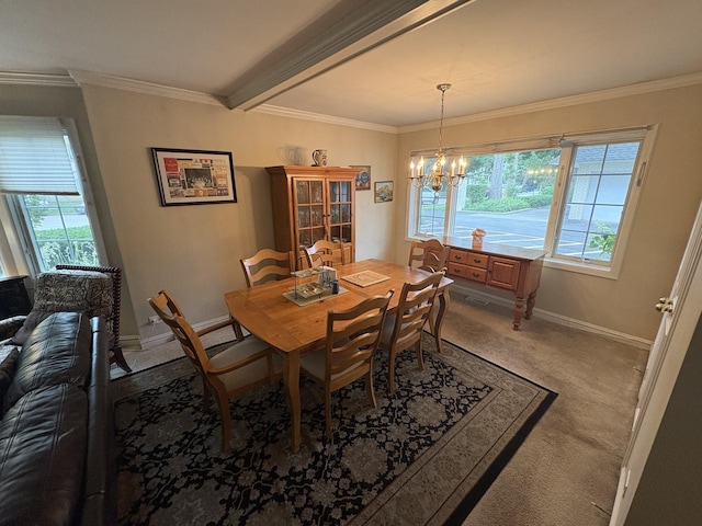 701 Ridge Rd Unit 1D, Wilmette, IL 60091 - carpeted dining room featuring a chandelier and crown molding