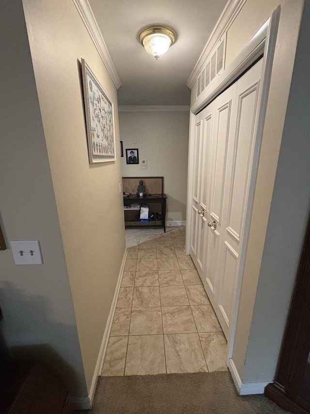 701 Ridge Rd Unit 1D, Wilmette, IL 60091 - hallway featuring ornamental molding and light marble finish flooring