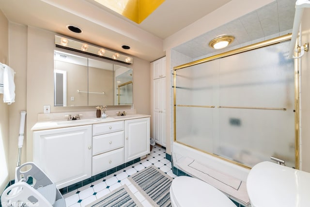 235 S Warrington Rd, Des Plaines, IL 60016 - bathroom with double vanity and shower / bath combination with glass door