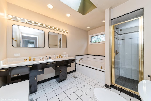 235 S Warrington Rd, Des Plaines, IL 60016 - full bath with a bath, a shower stall, double vanity, recessed lighting, and tile patterned floors